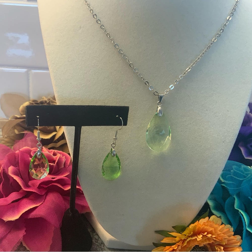 Lovely light green peridot color crystal necklace and earrings.